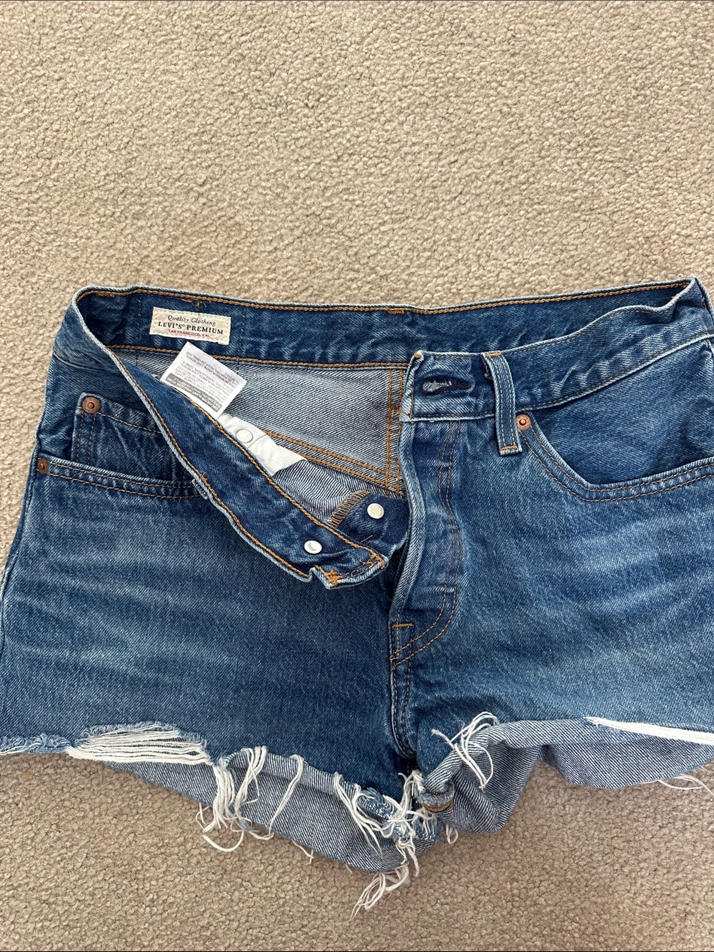 Levi's Distressed Dark Blue Denim Cutoff Shorts